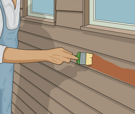 Bilden visar en hand med en pensel doppad i färg tryckt mot en träfasad byggd med liggande panel. Bilden illustrerar hur man målar några brädor i taget vid målning av liggande fasadpanel.
